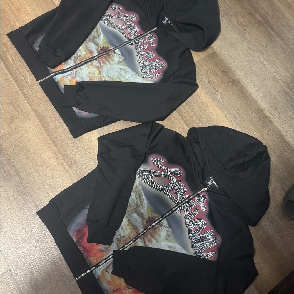 Black Zip-Up Hoodie with Graphic Design